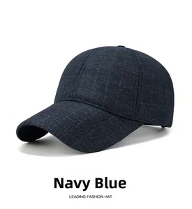 Detailed view of navy blue baseball cap with grid texture and classic curved brim design