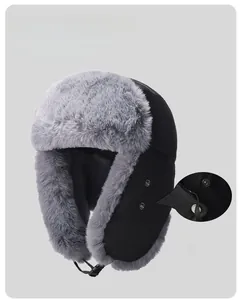 Winter trapper hat detail showing the detachable mask and warm gray faux fur lining