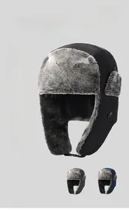Detail of winter trapper hat showing thick grey faux fur lining and windproof fabric