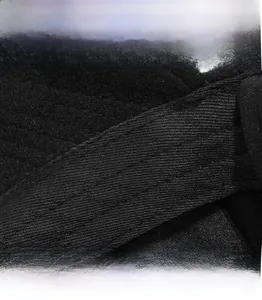 Detailed close-up of a sturdy brim and wide sweatband on a black wool baseball cap