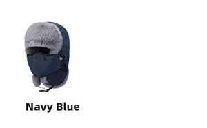 Detail view of navy blue winter trapper hat with detachable mask and faux fur lining