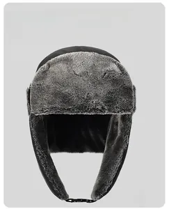 Detail of warm winter aviator hat with thick grey faux fur lining and windproof black fabric
