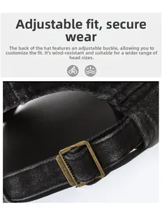 Detail of adjustable bronze metal buckle on vintage washed cotton flat top cap