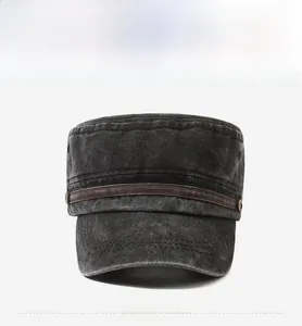 Front view of charcoal grey washed cotton flat top military cap with brown decorative strap