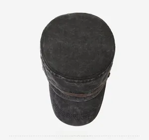 Top-down view of washed cotton cadet cap in dark grey with vintage canvas texture