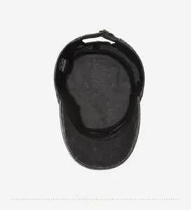 Detailed interior of vintage washed cotton cadet hat with sweatband and metal buckle
