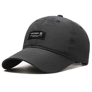 Waterproof quick-dry running baseball cap in dark grey with sports patch branding
