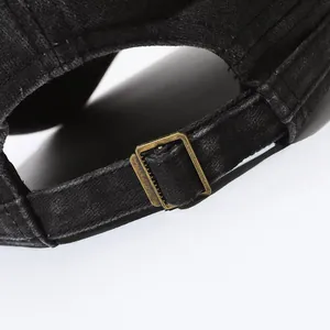 Men's washed vintage flat top cap in black cotton with adjustable metal buckle detail