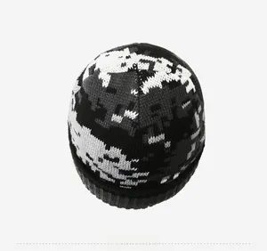 Top view of pixelated camo beanie showing knitted texture and stitch details