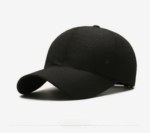 Detail showing the breathable laser-cut mesh and mountain logo on black baseball cap