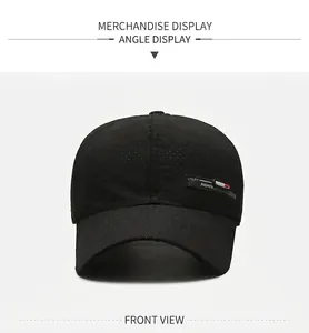 Macro view of black quick-dry baseball cap featuring breathable micro-hole mesh fabric