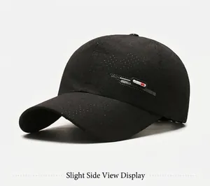 Detailed close-up of quick-dry mesh fabric and utility label on black baseball cap