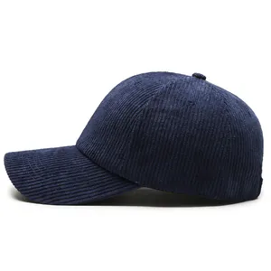 Classic dark blue corduroy baseball cap with a textured six-panel design and curved brim