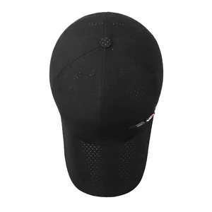 Quick-dry black mesh baseball cap with laser-cut ventilation and small utility label