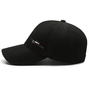 Black quick-dry mesh baseball cap with side utility patch and breathable fabric texture