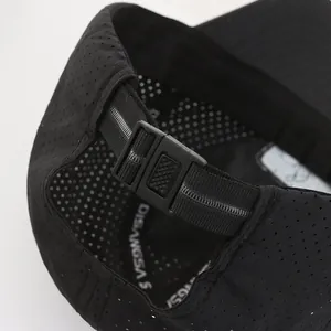 Rear view of black breathable quick-dry sports cap with laser-cut holes and buckle strap