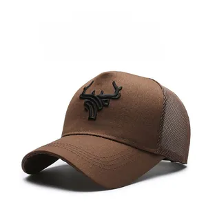 Detail of dark brown trucker hat with 3D bull horn embroidery and breathable mesh back