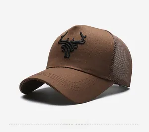 Side view of brown trucker hat featuring mesh back and 3D embroidered deer antlers