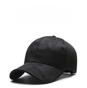 Close-up of breathable mesh fabric and dark camouflage texture on summer baseball cap