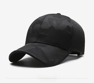 Detail view of the breathable black camo mesh fabric on the men's baseball sun cap