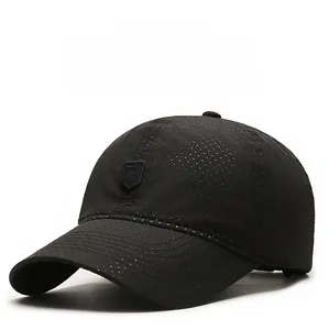 Macro detail of breathable mesh fabric on black baseball cap with shield logo