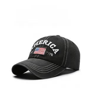 Detail of embroidered AMERICA logo and flag on a black washed cotton baseball cap