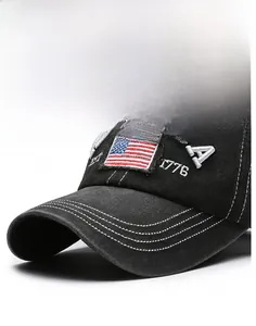 Detailed close-up of embroidered American flag and 1776 patch on vintage washed baseball cap