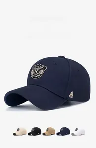 Macro view of detailed shield embroidery with R letter on high-density cotton baseball cap