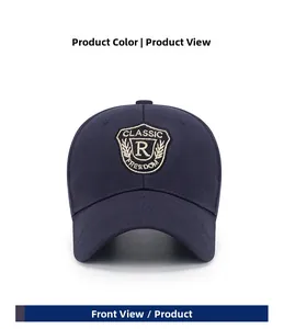Detail of navy blue baseball cap featuring golden R letter embroidery on a shield patch