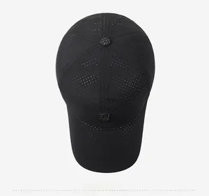 Detailed top view of a black breathable sports baseball cap with mesh fabric texture