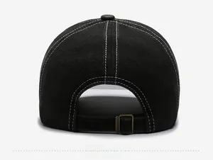 Detail of vintage washed black baseball cap showing back metal buckle and stitching