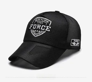 Detail of breathable black mesh back and embroidered shield patch on summer trucker cap
