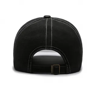 Vintage washed black baseball cap with white contrast stitching and metal back strap buckle