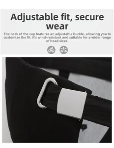 Macro shot of adjustable metal buckle and black canvas strap on baseball cap