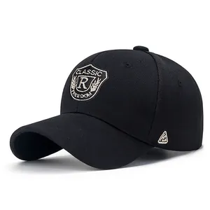 Classic black baseball cap with golden R letter shield embroidery and knit texture
