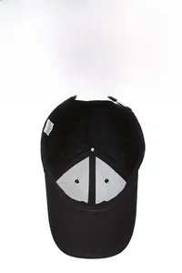 Internal view of black cotton baseball cap showing stitching, sweatband and label