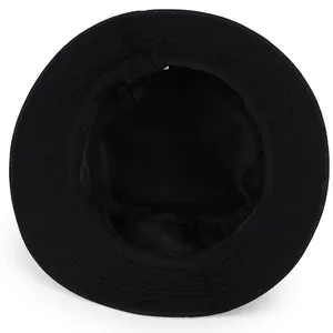 Minimalist black cotton bucket hat showing interior lining and sweatband details