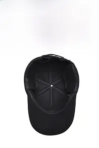 Close-up of black winter baseball cap with earflaps and thermal fleece lining for outdoor