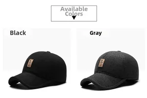 Detail view of winter baseball caps in black and grey with embroidered leather patch