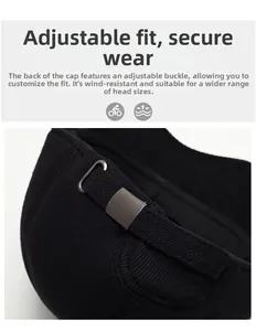 Detail of adjustable silver metal buckle and woven strap on black winter baseball cap