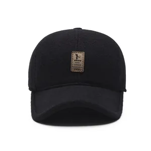 Winter baseball cap for men with ear protection and embroidery in thick black wool fabric