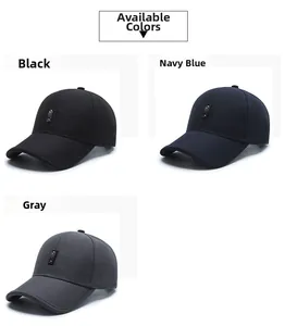 Detailed view of baseball caps in black, navy, and grey colors with embroidered patches