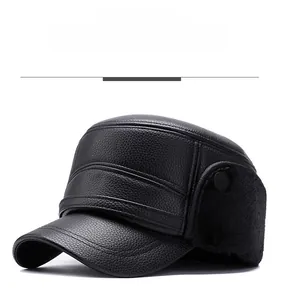 Detailed view of black PU leather flat cap with warm plush lining and ear flaps