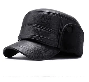 Detailed close-up of winter black PU leather flat cap with warm faux fur earflaps