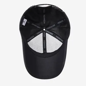 Internal view of black baseball cap showing reinforced seams and size S wash label