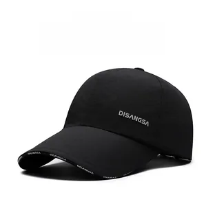 Macro detail of waterproof nylon baseball cap with side logo and fine fabric texture