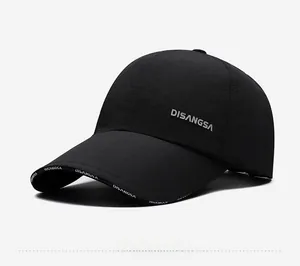 Side view of black nylon baseball cap with brand logo and quick-dry fabric details