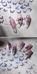 Macro detail of M-518 holographic butterfly nail stickers with purple metallic finish