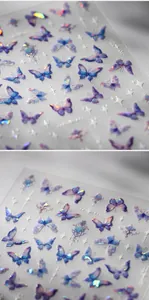 Detail of 3D iridescent butterfly nail stickers with laser holographic magic star motifs