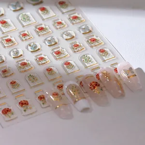 3D embossed nail stickers featuring red roses, blue butterflies and gold foil textures